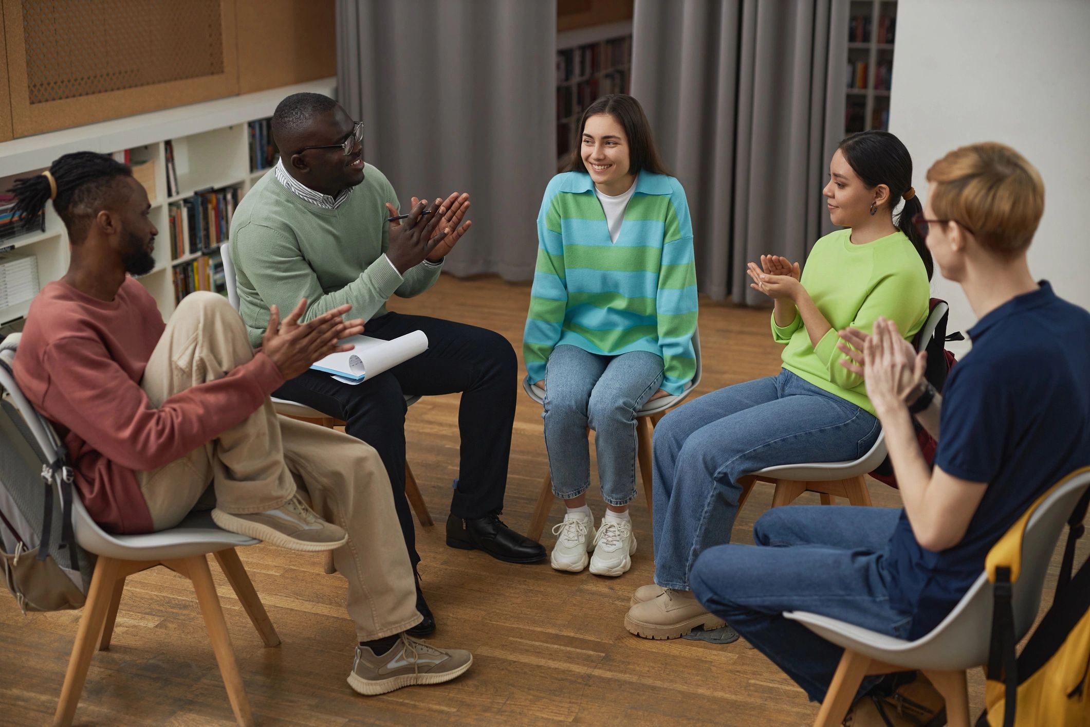 Nurse guiding a patient through education about their care plan